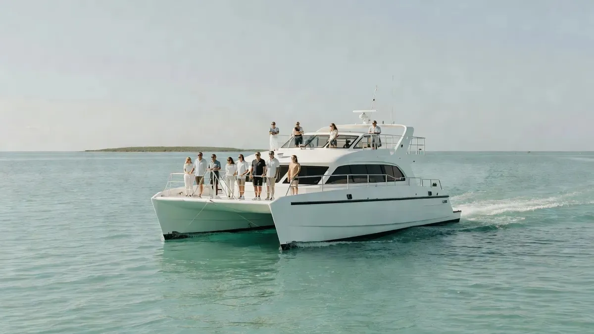 Xcaret luxury passenger ferry departing Playa del Carmen for the island of Cozumel on a Playa del Carmen boat tour, Mexico